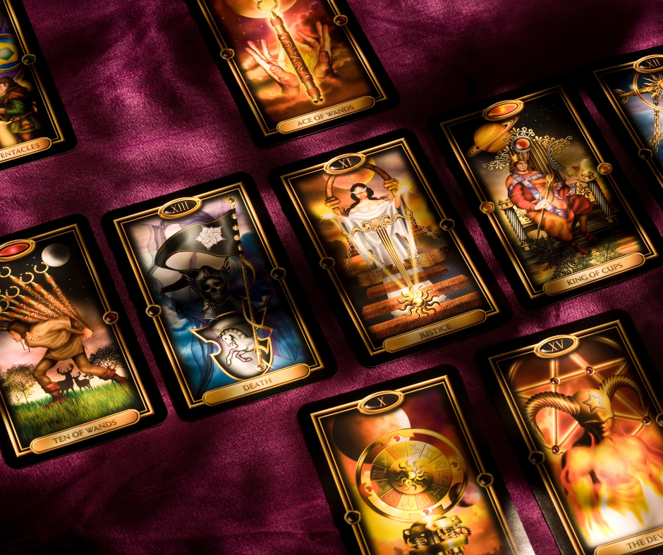 nine of cups tarot cards on table